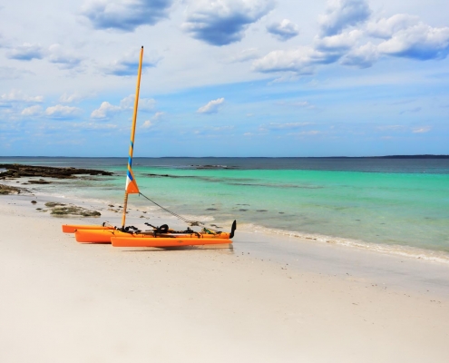 Sailing boat on beach Jervis bay